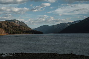 Teletsky mountain lake in Altay with blue autumn sky
