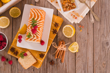 Lemon sponge cake with pomegranate.	