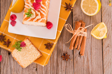 Lemon sponge cake with pomegranate.	