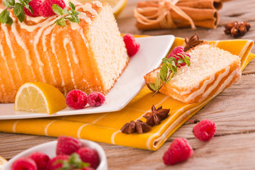 Lemon sponge cake with pomegranate.	