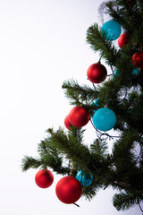 Christmas toys on fir branches