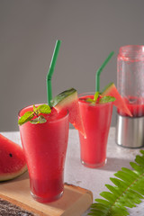 Watermelon smoothie on a wooden. Beverage fruit