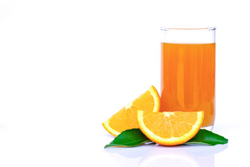 Glass of fresh orange juice with slice of  tangerine or mandarin orange fruit and  green leaf isolated on white background. 
