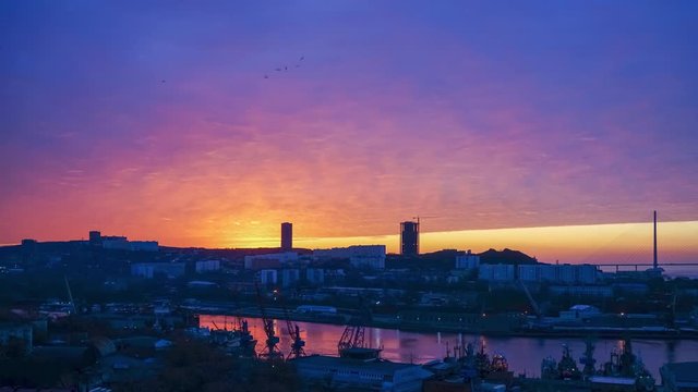 Time laps of a bright sunrise over the Bay of Vladivostok, Russia