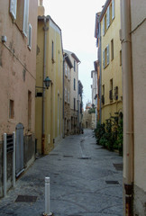 Old Narrow streets of Antibes resort town. French Riviera, France  