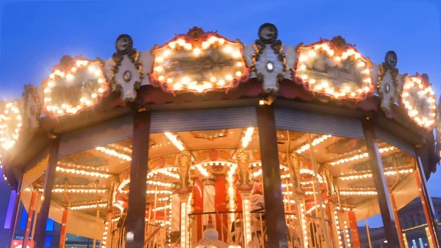Old French traditional fairground vintage carouse in a holiday park