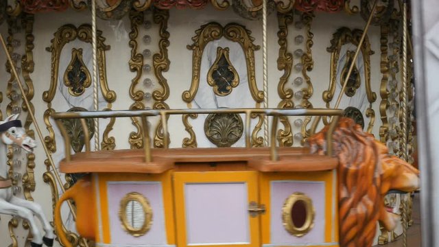 Old French traditional fairground vintage carouse in a holiday park