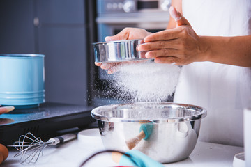 Woman girl in kitchen cooking baker bakery powder dough