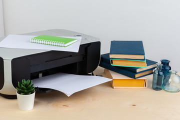 Office printer close up on a wooden table