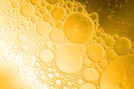 Yellow coocing Oil bubble on water. 