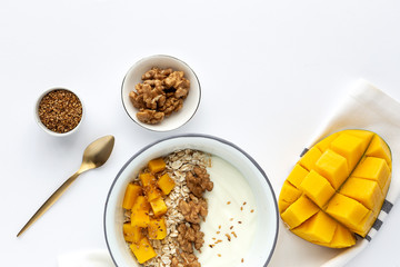 Bowl of homemade granola with yogurt and cereals