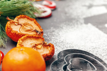 Dried fruit slices with cookies close up on kitchen table
