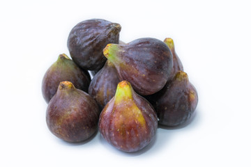 natural black figs isolated on white background