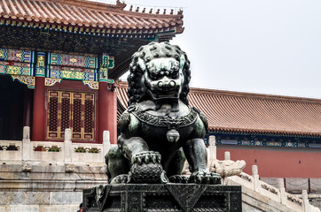 Dark Bronze Lion in front of Palace at Forbidden City