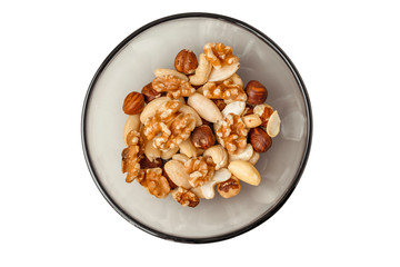Walnuts in bowl isolated on white background