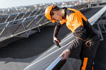 Workman on the solar station