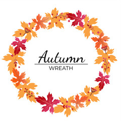 Naklejka na ściany i meble Autumn wreath of maple leaves in autumn color