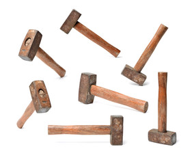 old sledge hammer with wooden handle on a white background