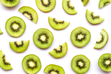 Fresh sliced of kiwi fruit isolated on white background.Top view. Flat lay - obrazy, fototapety, plakaty