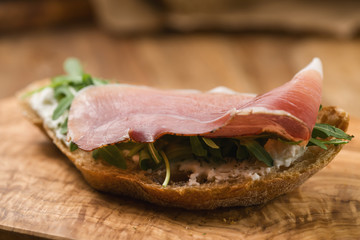 italian sandwich with speck and arugula