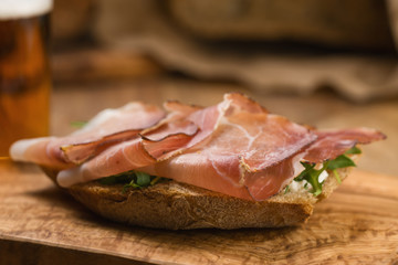 italian sandwich with speck and arugula