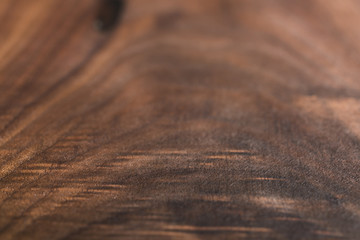 Angle closeup shot of black walnut wood surface