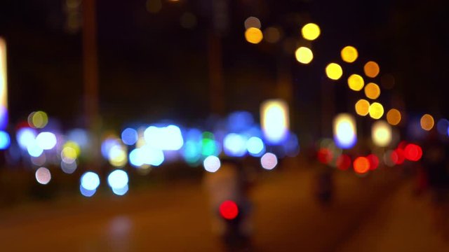 Blurred image of the lights of the night city. Beautiful bokeh. Variable focus.