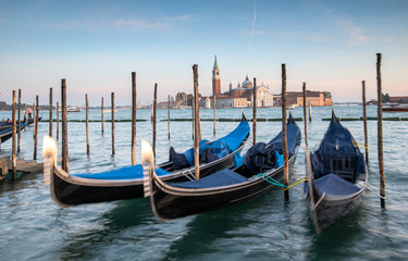 Fototapeta na wymiar Venice Gondolas moored at the San Marco square.