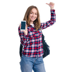 Portrait casual woman, student with backpack holding mobile phone in hand standing smiling showing on white background isolation