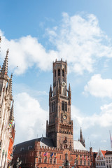 Fototapeta na wymiar Grote Markt square or Market Square in Brugge and Belfort tower, Belgium