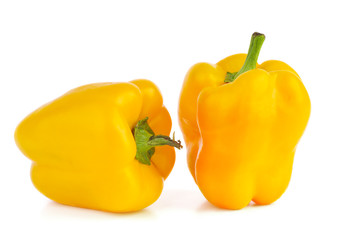 Two yellow sweet peppers
