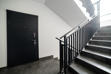 apartment building with a new design. metal handrails for people. Loft style in the house