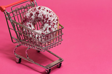 Macro shoot of donut on pink