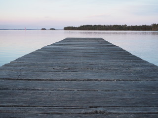 Obraz premium wooden jetty at sunset