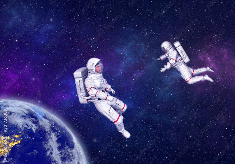 Wall mural astronauts floating and exploring in deep space above planet earth. elements of this image furnished