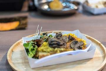 Sourdough bread with vegetable salad at restaurant