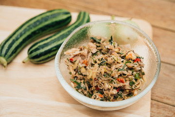 Thai southern spicy Budu salad and herb at market