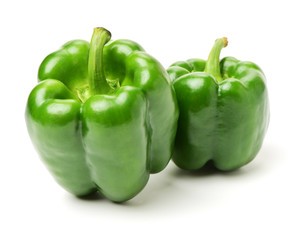 fresh green bell pepper (capsicum) on a white background