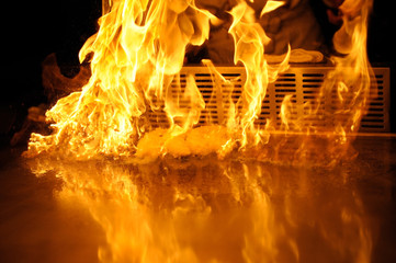 Close-up fire flames at Teppanyaki table