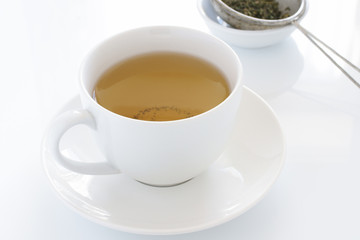Herbal tea in a white china cup