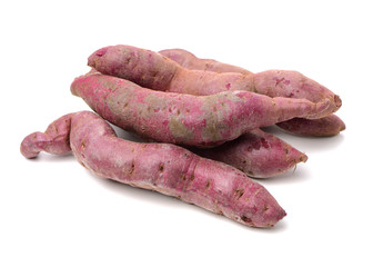 Purple Colored Sweet Potatoes on White background