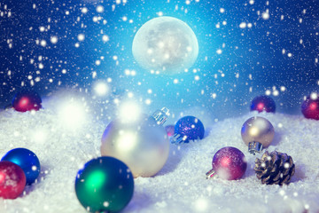 Snow christmas magic lights background. Christmas card with a winter forest and christmas decorations in a moonlit night. The elements of this image furnished by NASA