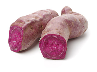 Purple Colored Sweet Potatoes on White background