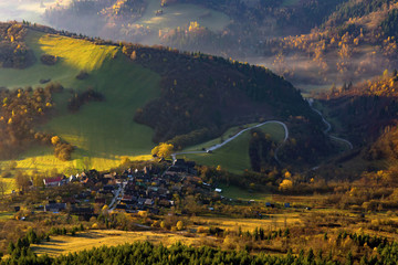 Fall in Slovakia. Meadows and fields landscape near Unesco monument reservation Vlkolinec at sunrise. Autumn colored trees. © matkovci