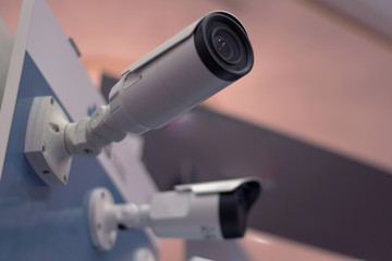 Security CCTV camera or surveillance system in office building, Intelligent cameras can record video all day and night to keep you safe from thieves. Surveillance camera Anti-theft system concept.