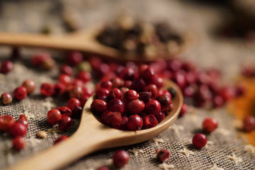 Spices and herbs on old kitchen table.