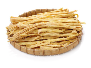 Obraz premium Dried yuba sticks or Fuzhu on white background