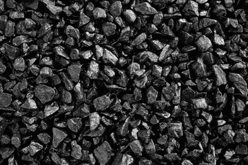 Black Stones background. Abstract texture with copy space.