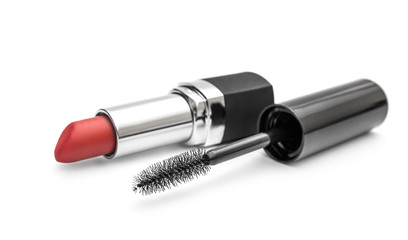 Makeup mascara with lipstick on white.