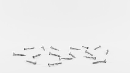 Silver metallic screw nails on white background, perspective concept. Steel screws background with...